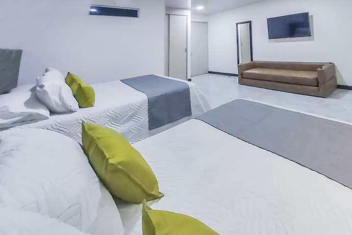 Imagen de la habitación del Hotel Los Maderos. Foto 9