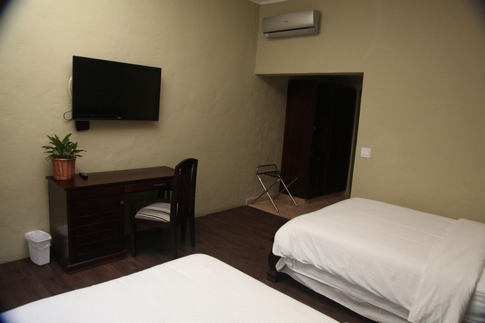 Imagen de la habitación del Hotel Los Mandarinos Boutique Spa and. Foto 8