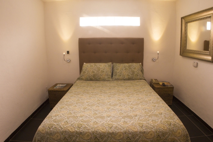 Imagen de la habitación del Hotel Los Milagros. Foto 4