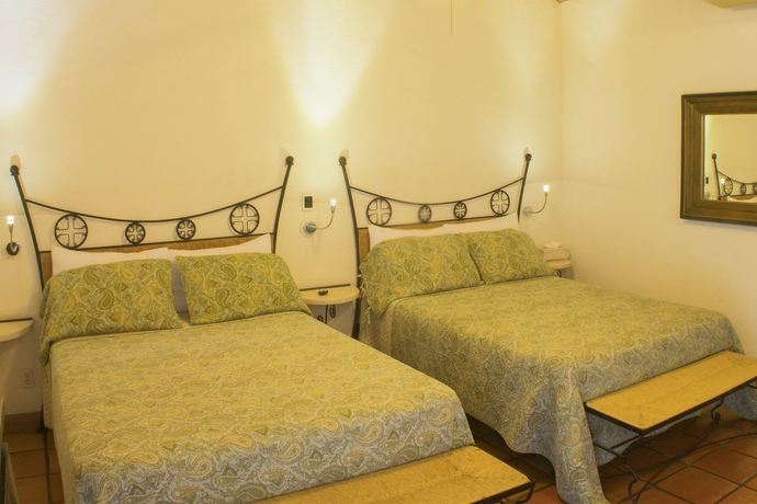 Imagen de la habitación del Hotel Los Milagros. Foto 5