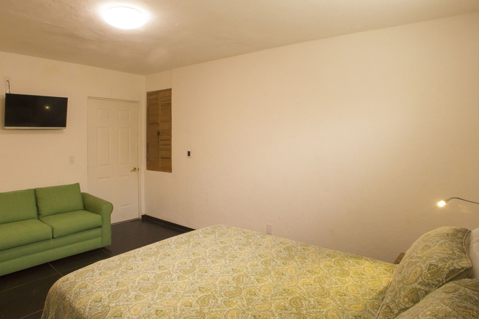 Imagen de la habitación del Hotel Los Milagros. Foto 6