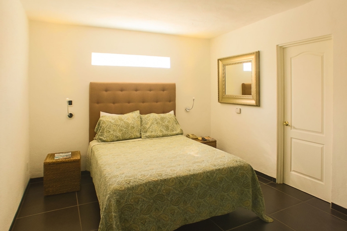 Imagen de la habitación del Hotel Los Milagros. Foto 7