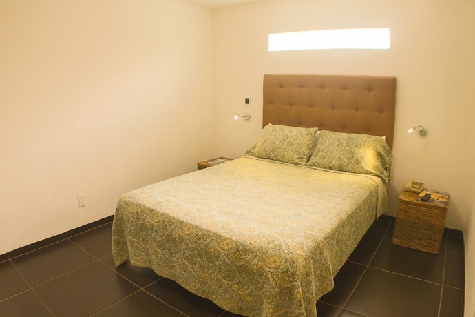 Imagen de la habitación del Hotel Los Milagros. Foto 8