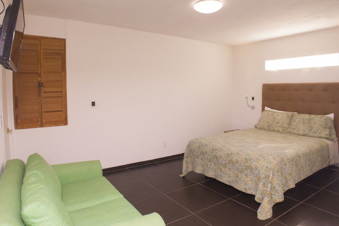 Imagen de la habitación del Hotel Los Milagros. Foto 9