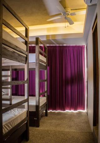 Imagen de la habitación del Hotel Los Muertos Hostal. Foto 9