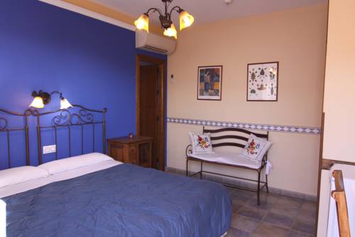 Imagen de la habitación del Hotel Los Palmitos Hospedería Rural. Foto 7