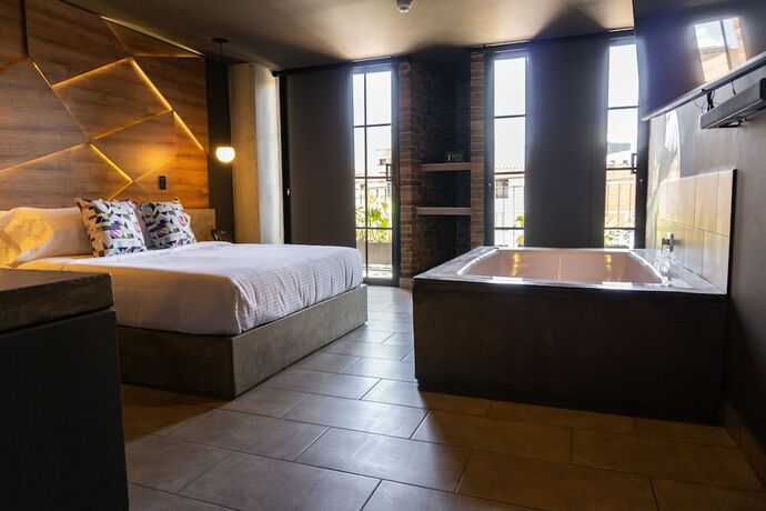 Imagen de la habitación del Hotel Los Patios Cool Living. Foto 18