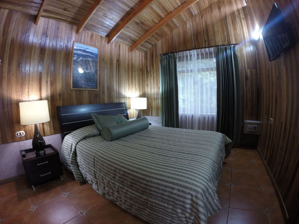 Imagen de la habitación del Hotel Los Pinos Cabanas Y Jardines. Foto 1