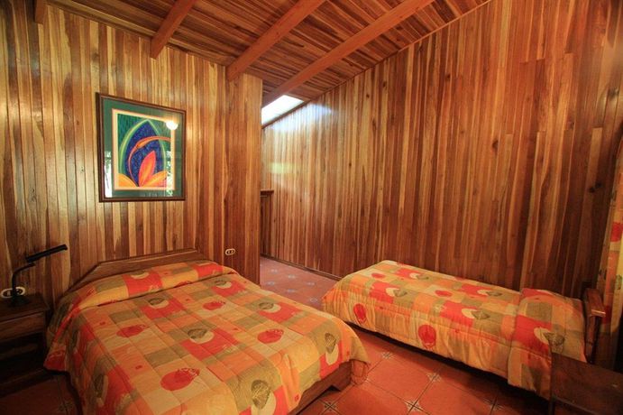 Imagen de la habitación del Hotel Los Pinos Cabanas Y Jardines. Foto 5