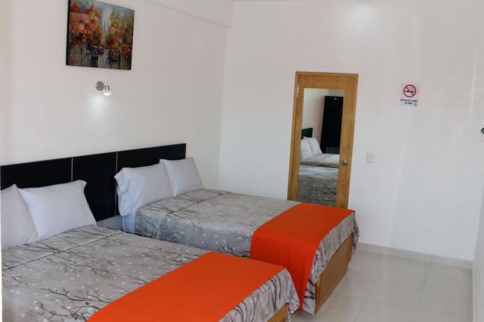 Imagen de la habitación del Hotel Los Pinos Express. Foto 6