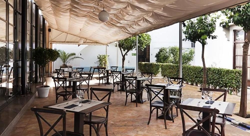 Imagen del bar/restaurante del Hotel Los Seises Sevilla, A Tribute Portfolio. Foto 5