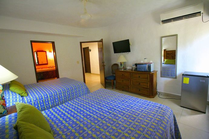 Imagen de la habitación del Hotel Los Tules Villas del Sol. Foto 3