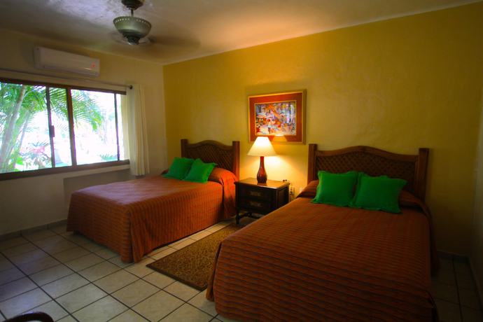 Imagen de la habitación del Hotel Los Tules Villas del Sol. Foto 4