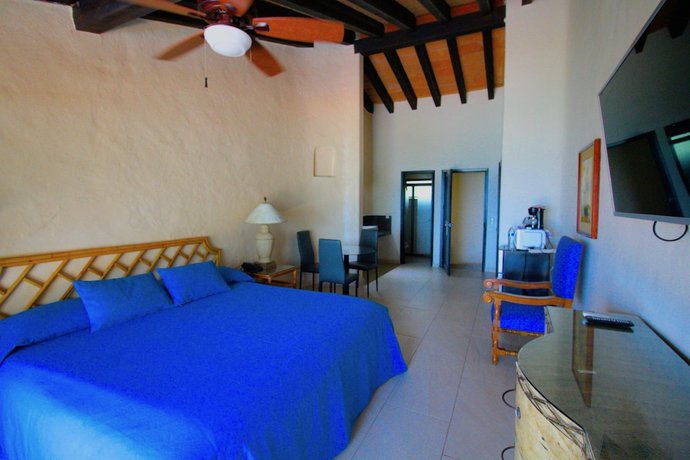 Imagen de la habitación del Hotel Los Tules Villas del Sol. Foto 10