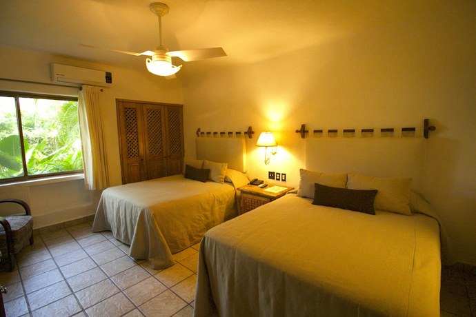 Imagen de la habitación del Hotel Los Tules Villas del Sol. Foto 13