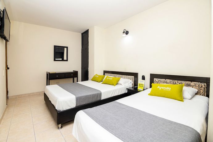 Imagen de la habitación del Hotel Los Tunjos. Foto 13