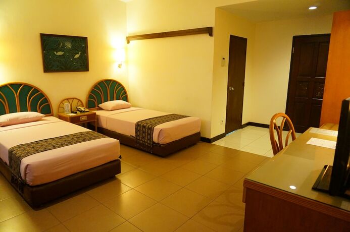 Imagen de la habitación del Hotel Losari Beach Inn. Foto 29