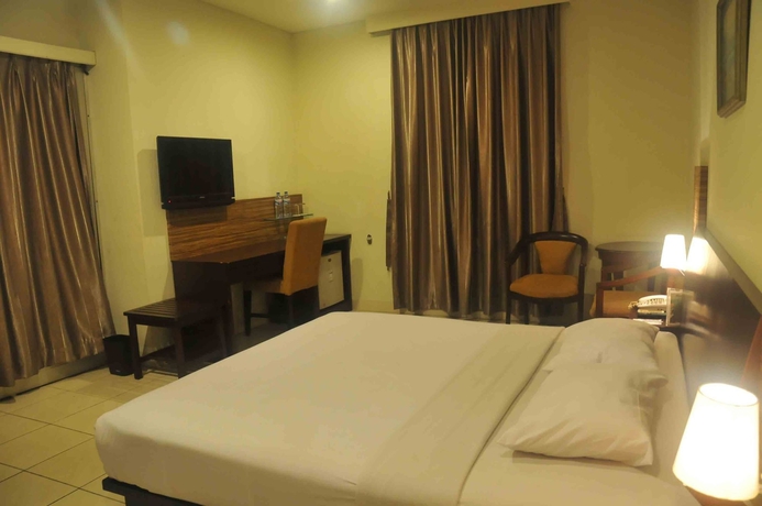 Imagen de la habitación del Hotel Losari Blok M Jakarta. Foto 3