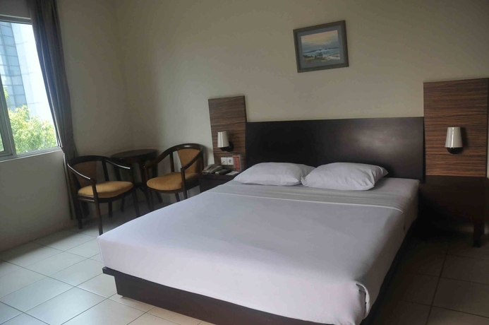 Imagen de la habitación del Hotel Losari Blok M Jakarta. Foto 8