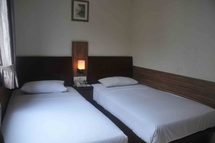 Imagen de la habitación del Hotel Losari Blok M Jakarta. Foto 9