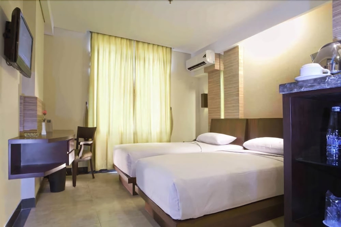 Imagen de la habitación del Hotel Losari Roxy. Foto 8