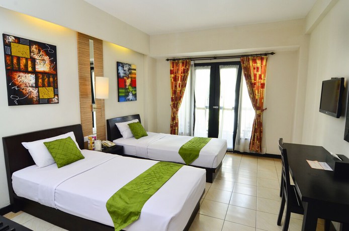 Imagen de la habitación del Hotel Losari and Villas Kuta Bali. Foto 3