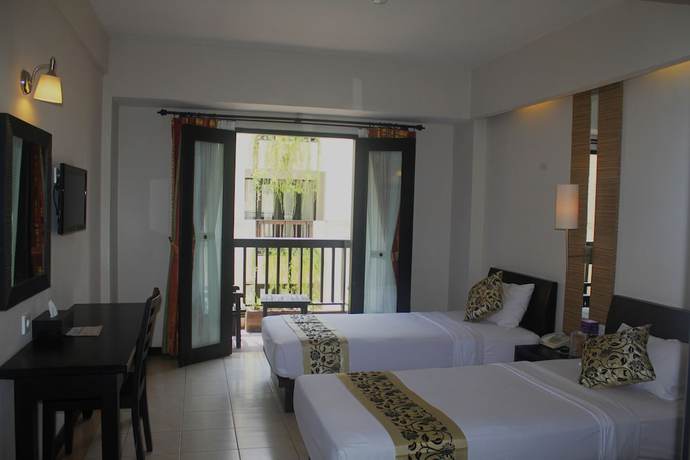Imagen de la habitación del Hotel Losari and Villas Kuta Bali. Foto 4