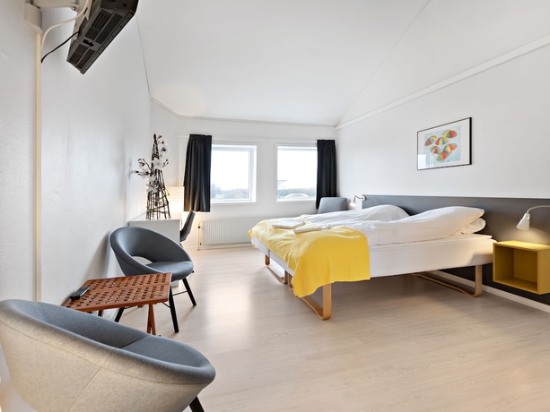 Imagen de la habitación del Hotel L&oslash;gst&oslash;r Parkhotel. Foto 4