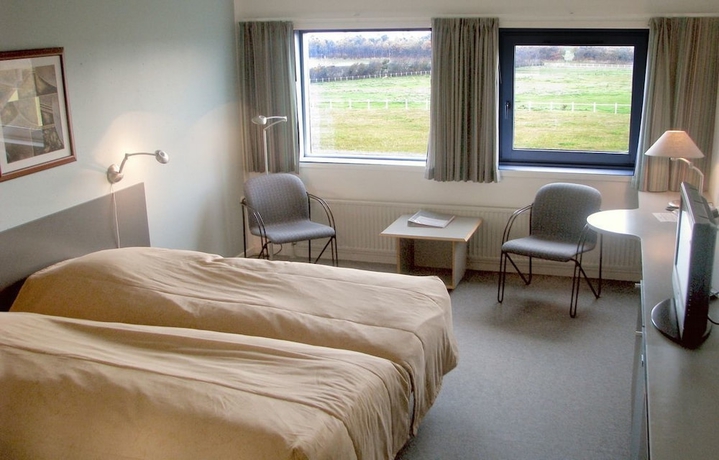 Imagen de la habitación del Hotel L&oslash;gst&oslash;r Parkhotel. Foto 11