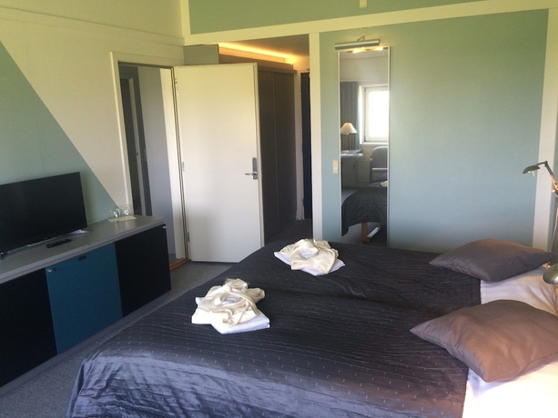 Imagen de la habitación del Hotel L&oslash;gst&oslash;r Parkhotel. Foto 12