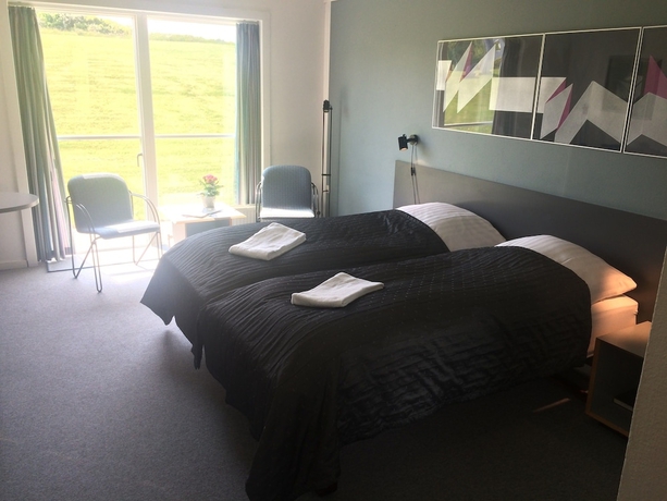 Imagen de la habitación del Hotel L&oslash;gst&oslash;r Parkhotel. Foto 16