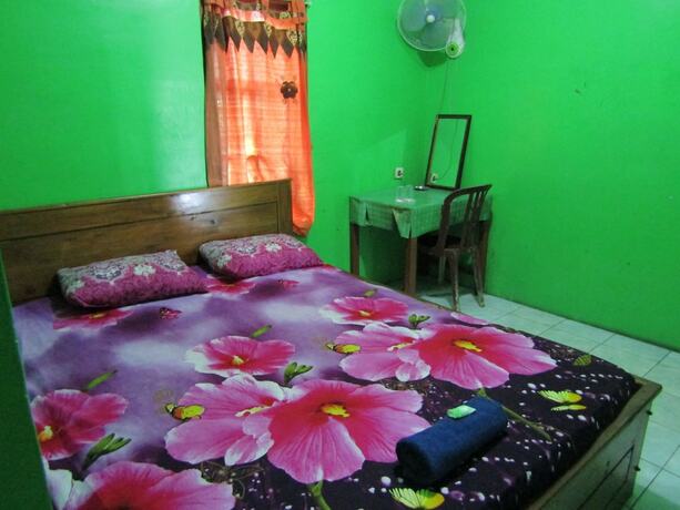 Imagen de la habitación del Hotel Losmen Kinasih Puncak and Gazebo Pandang. Foto 15