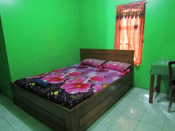 Imagen de la habitación del Hotel Losmen Kinasih Puncak and Gazebo Pandang. Foto 16