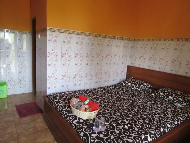 Imagen de la habitación del Hotel Losmen Kinasih Puncak and Gazebo Pandang. Foto 17