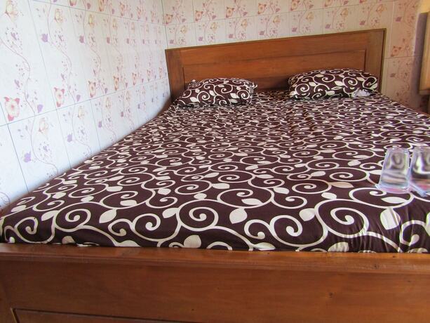 Imagen de la habitación del Hotel Losmen Kinasih Puncak and Gazebo Pandang. Foto 18