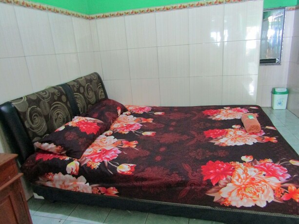 Imagen de la habitación del Hotel Losmen Kinasih Puncak and Gazebo Pandang. Foto 20