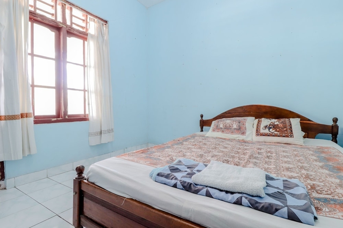 Imagen de la habitación del Hotel Losmen Parikesit. Foto 2