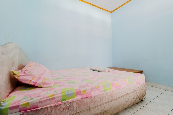 Imagen de la habitación del Hotel Losmen Parikesit. Foto 6