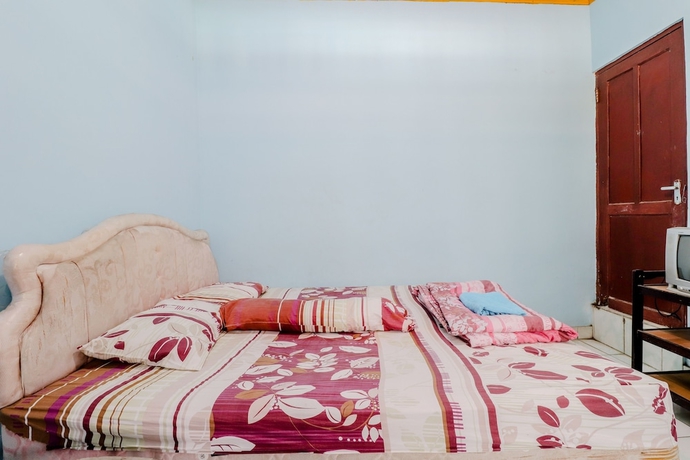 Imagen de la habitación del Hotel Losmen Parikesit. Foto 8