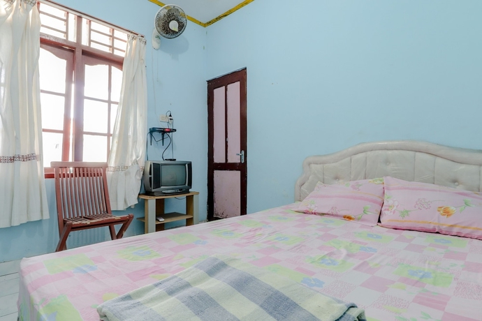 Imagen de la habitación del Hotel Losmen Parikesit. Foto 9