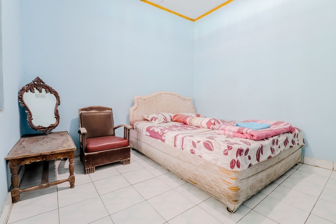 Imagen de la habitación del Hotel Losmen Parikesit. Foto 10