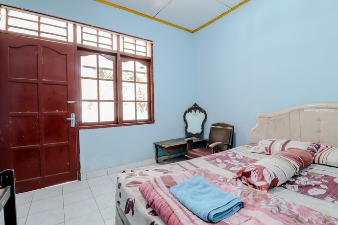 Imagen de la habitación del Hotel Losmen Parikesit. Foto 11