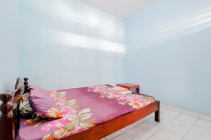 Imagen de la habitación del Hotel Losmen Parikesit. Foto 13