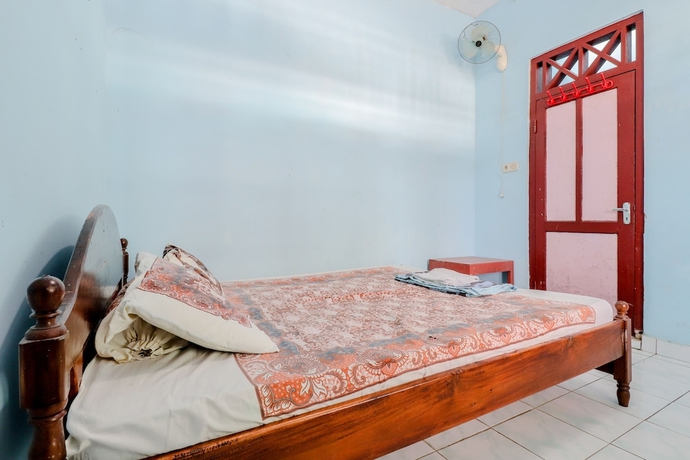 Imagen de la habitación del Hotel Losmen Parikesit. Foto 16