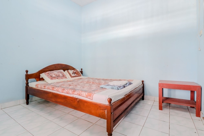 Imagen de la habitación del Hotel Losmen Parikesit. Foto 17