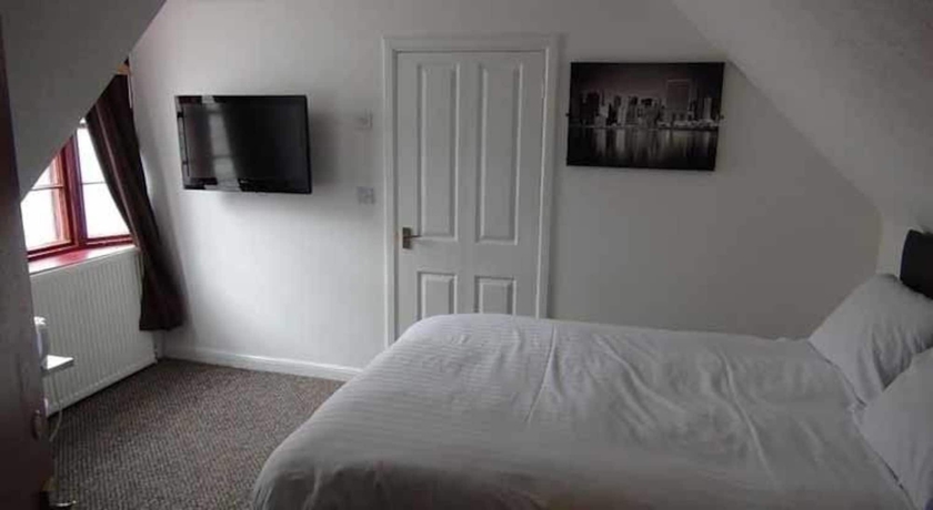 Imagen de la habitación del Hotel Lost Guest House Peterhead. Foto 8