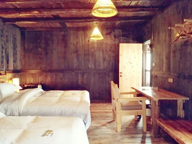 Imagen de la habitación del Hotel Lost World Sanjiang. Foto 13