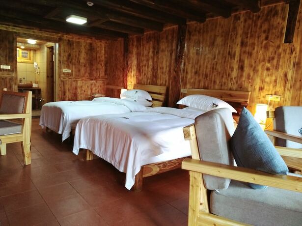 Imagen de la habitación del Hotel Lost World Sanjiang. Foto 15