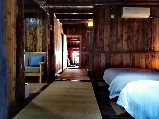 Imagen de la habitación del Hotel Lost World Sanjiang. Foto 19