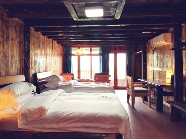 Imagen de la habitación del Hotel Lost World Sanjiang. Foto 25